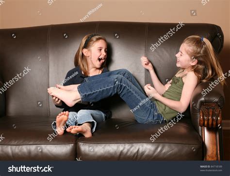 tickling girls feet